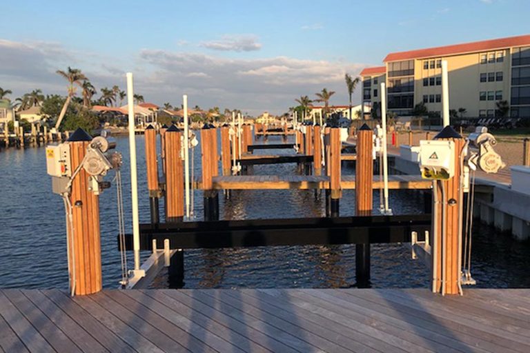 MARCO ISLAND CONDOS DOCKS REBUILT WITH GOLDEN BOAT LIFTS July 6, 2018